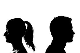 silhouette of man and woman facing away from eachother